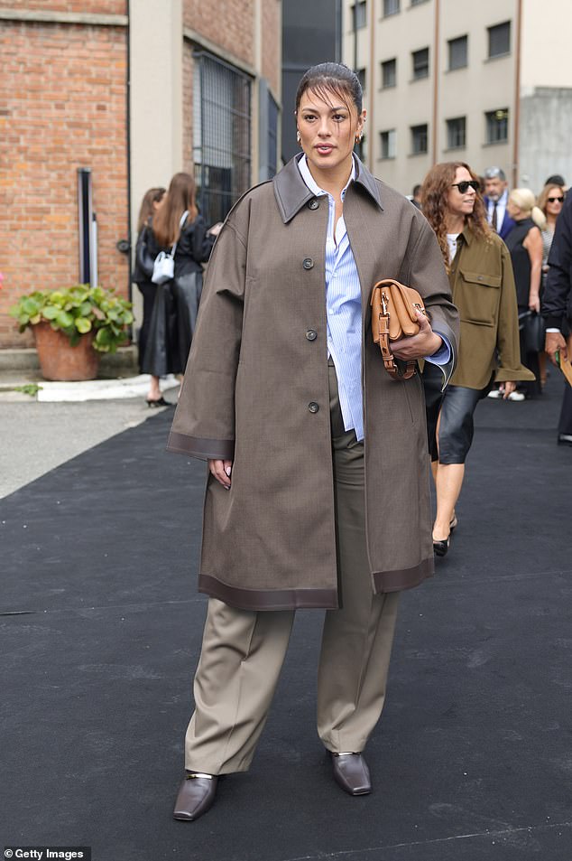 Model Ashley Graham, 36, opted for a baggy look with gray pants and a baggy blue shirt