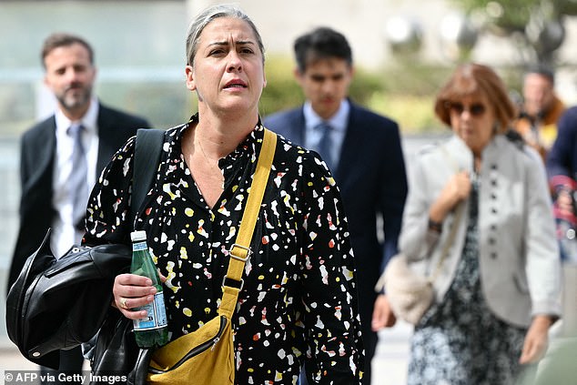 Gisele Pelicot's daughter, Caroline Darian, arrives at the Avignon courthouse on Tuesday flanked by her mother Gisele Pelicot