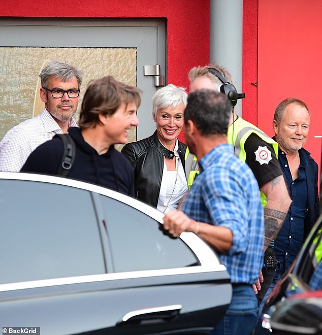 The actor beamed as he jumped into a waiting car with INEOS' David Horrocks and the chemicals conglomerate's finance director and co-owner John Reece