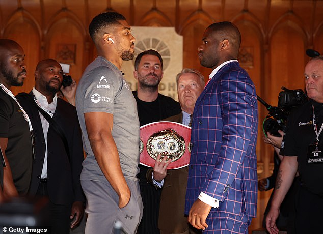 The fighters faced off after a tense encounter, with Dubois (right) claiming he was 'ready to make history'