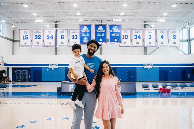 Embiid signed his new contract along with his wife Anne de Paula and their four-year-old son Arthur