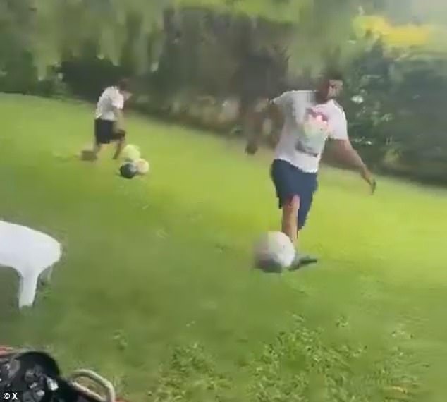 Nestor Ortigoza is recorded kicking a soccer ball that would eventually knock the cell phone out of the hands of his now estranged wife, Lucia Cassiau. The ball also hit her in the face