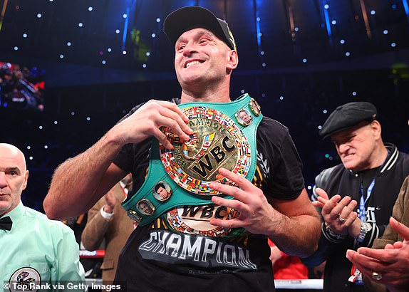 LONDON, ENGLAND - DECEMBER 3: Tyson Fury celebrates his victory over Derek Chisora ​​during their WBC heavyweight championship match at Tottenham Hotspur Stadium on December 3, 2022 in London, England. (Photo by Mikey Williams/Top Rank Inc via Getty Images)