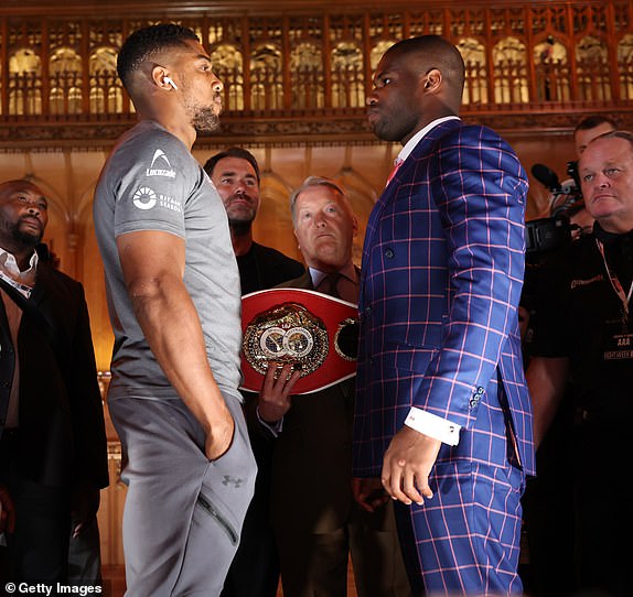 LONDON, ENGLAND - SEPTEMBER 19: Anthony Joshua (left) and Daniel Dubois (right) during a press conference as part of the Riyadh Season - Wembley Edition card at Guildhall on September 19, 2024 in London, England. (Photo by Mark Robinson/Matchroom Boxing/Getty Images)