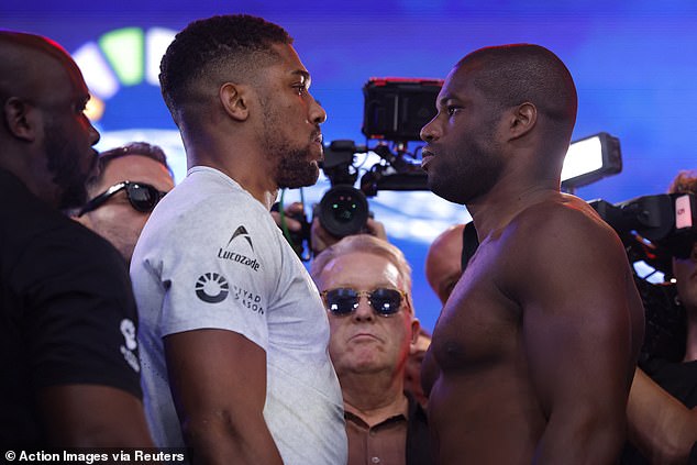 Both fighters remained disciplined as they faced each other after the weigh-in with the crowd watching on.