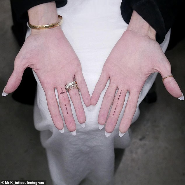 Last August, she debuted mysterious ink on each of her middle fingers, applied by tattoo artist MR.K.