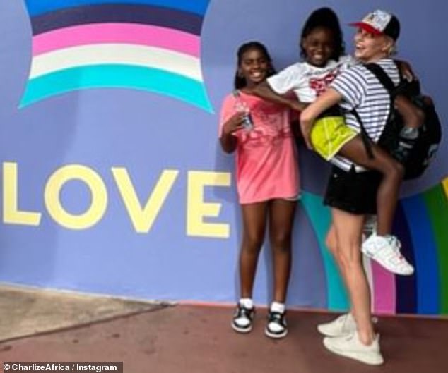 The actress with her children at Disney World earlier this year