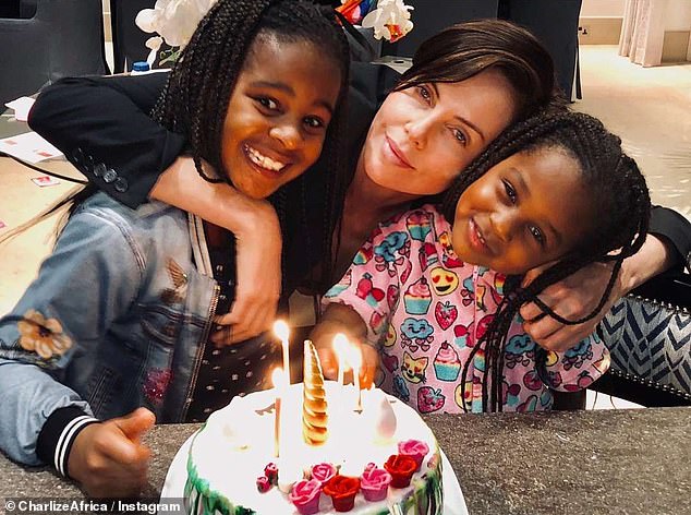 Here she is seen with her children at a birthday party