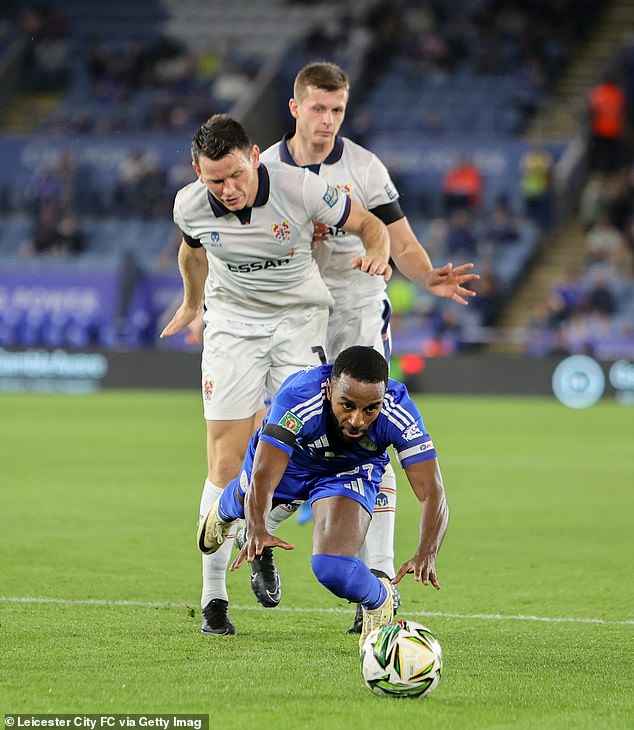 Leicester City captain Ricardo Pereira is fouled by two Tranmere Rovers players last month