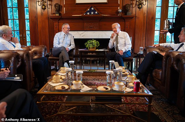 Mr Albanese was welcomed at Joe Biden's private residence (he is pictured with Australian Ambassador to the US Kevin Rudd (left) and US Secretary of State Antony Blinken (right)