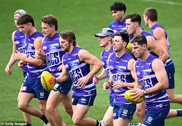 The Cats players were shocked to see the coach collapse in front of their eyes as they prepared for their preliminary final against the Brisbane Lions