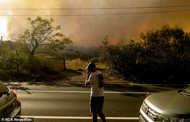 A local resident said many tourists had come to watch the fire, but he had urged them to keep the roads clear for the fire brigade.