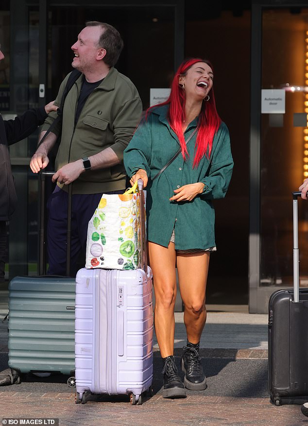 Chris McCauseland and his professional partner Dianne Buswell were in high spirits as they left the hotel giggling