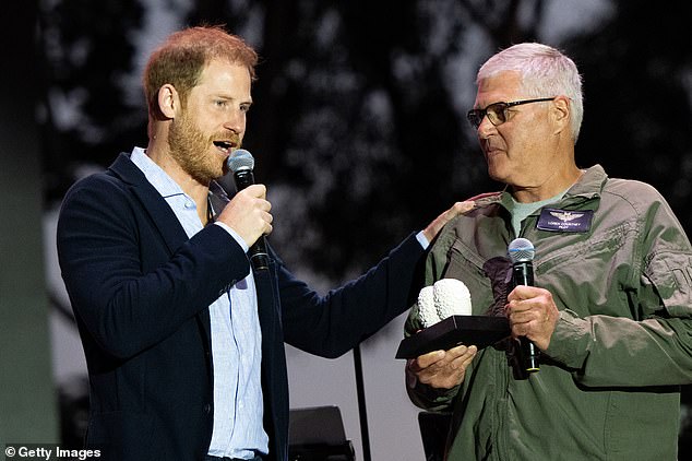 During the event, the royal father of two presented an award to local pilot Loren Courtney (pictured)