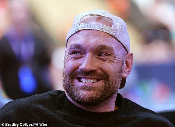 Tyson Fury in the stands at Wembley Stadium, London. Photo date: Saturday 21st September 2024. PA photo. See PA story BOXING London. Photo credits must read: Bradley Collyer/PA Wire. RESTRICTIONS: Usage subject to restrictions. Editorial use only, no commercial use without prior permission from the rights holder.