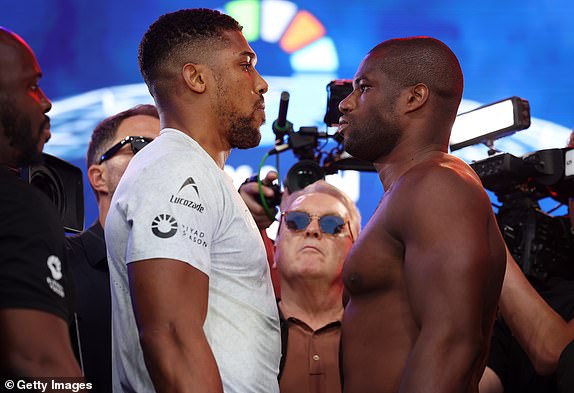 LONDON, ENGLAND - SEPTEMBER 20: Anthony Joshua and his opponent Daniel Dubois face off during their weigh-in as part of the Riyadh Season - Wembley Edition card at Trafalgar Square on September 20, 2024 in London, England. (Photo by Mark Robinson/Matchroom Boxing/Getty Images)