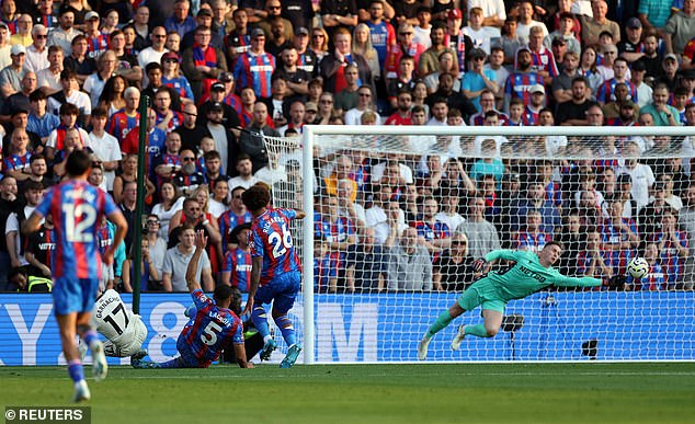 Henderson stretched to his left to tip Garnacho's effort wide of the far post