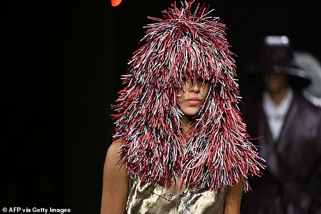 The models were able to walk in a straight line despite the headgear appearing to cover their eyes