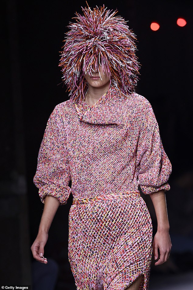 A model walks the catwalk during the Bottega Veneta fashion show