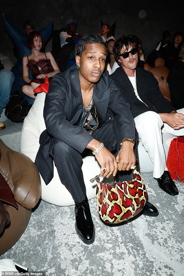 Also in attendance was Bottega Veneta ambassador Asap Rocky, who looked typically fashionable in a suit ensemble and carried a red printed leather bag