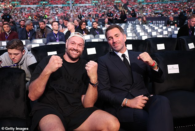 Tyson Fury (left) was one of many celebrities in attendance on Saturday night. Could the Gypsy King be next for Dubois?