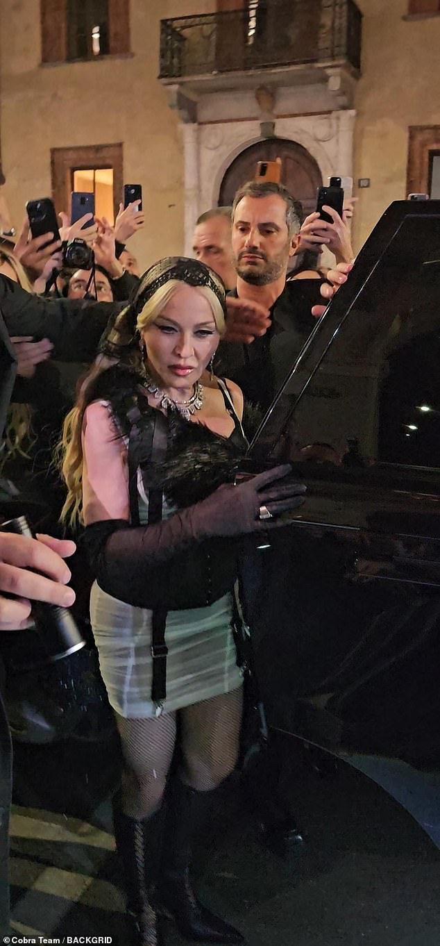 Madonna was spotted walking through a crowd after getting out of her car to attend the afterparty in the Italian city