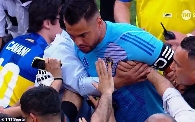 Romero was forcibly restrained by several club officials as the fan was dragged away