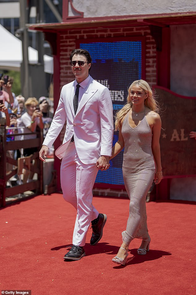 Paul Skenes and Olivia Dunne arrive at the 2024 All-Star Red Carpet Show in Arlington