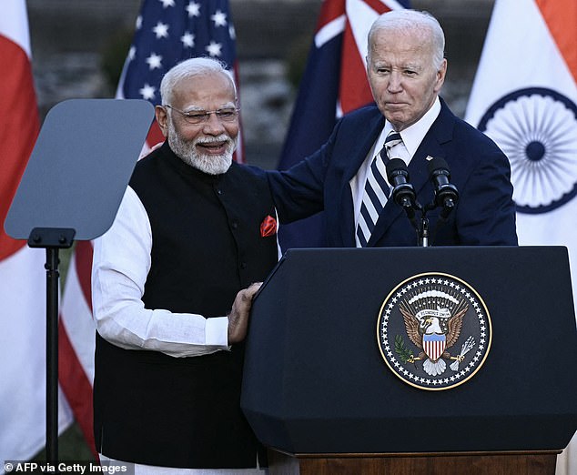 Indian Prime Minister Narendra Modi, pictured next to Biden, was the man lined up to speak, allowing Biden to joke about the gaffe