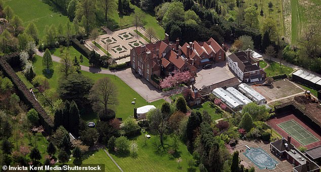 A former personal assistant to Al-Fayed has accused the disgraced businessman of groping her in front of his three children at his Surrey mansion (pictured) when she was just 19.