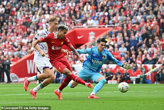 Luis Diaz (center) scored two goals in the first 28 minutes to put the Reds in control