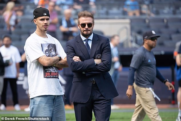 The former Brentwood player, 22, looked relaxed during the match as he walked onto the pitch in a Juice movie T-shirt with the words 'Power respect juice' - a reference to the 1992 American crime thriller