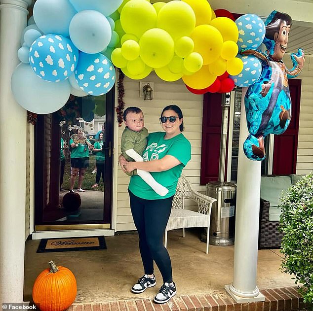 The boy is seen here outside his home with his mother, Chelsea Oliver, on Monday as his road to recovery continues