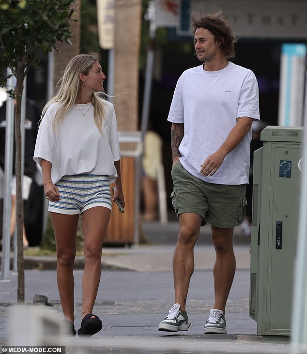 The Cronulla Sharks superstar wore a casual white T-shirt with cargo green shorts on Sunday