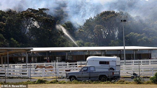 Firefighters were first called to a small grass fire at around 2am on Sunday, pictured is the threatened South East Equestrian Club