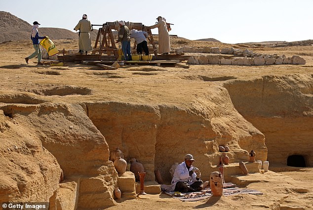 Gisr el-Mudir is one of the oldest known stone structures in Egypt, just a few hundred meters west of the Pyramid of Djoser. The function of the space has long been unclear. Pictured: Egyptian archaeologists at Gisr el-Mudir in January 2023