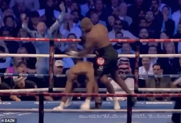 McGregor was seen jumping with both arms up into the crowd during the fight