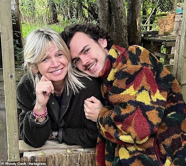 It comes as Zoe's son Woody Cook revealed he is 'happy to see her smile during difficult times' after she was photographed being comforted by her ex-husband Norman Cook, aka Fatboy Slim