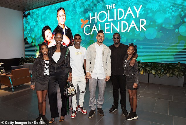 Porter (second from left) poses with her children and Combs on October 30, 2018, about two weeks before her death