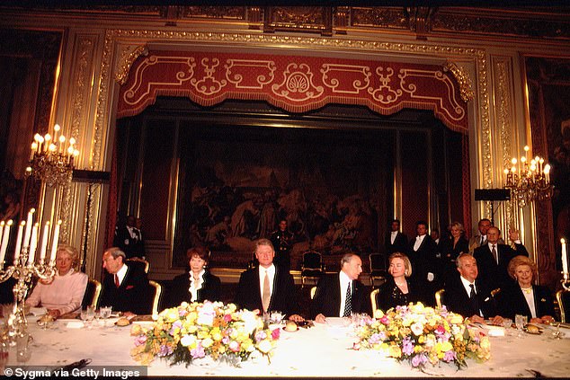 Harriman, far right, is pictured at a diplomatic dinner at the Elysee Palace in Paris, honoring her protégé, President Bill Clinton, center