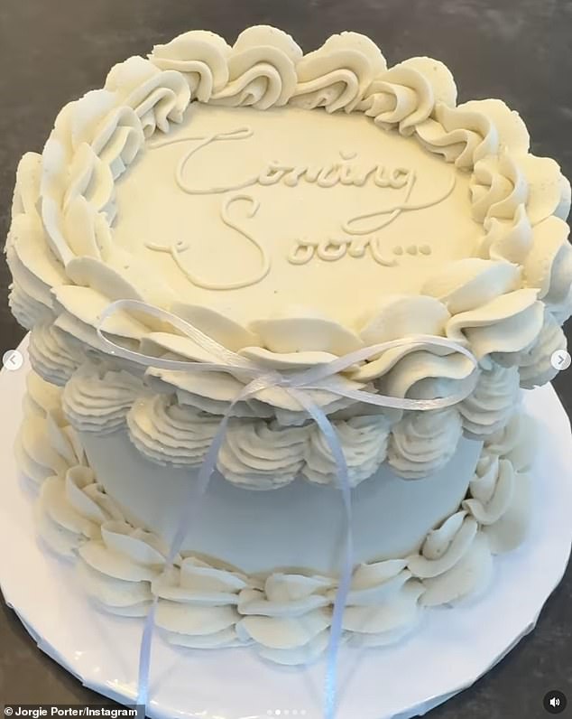 The star also shared a video of an elaborate white frosted cake with 'Coming Soon...' written on it in icing.