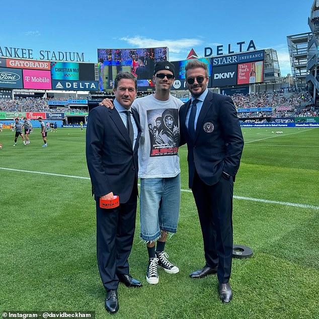 Beckham posed with sports agent David Gardner and son Romeo Beckham at Yankee Stadium