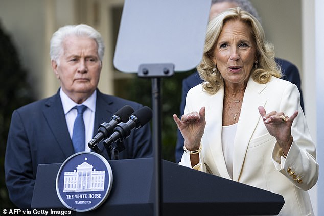 Actor Martin Sheen (left) stands next to first lady Jill Biden (right) during an event celebrating the TV show The West Wing