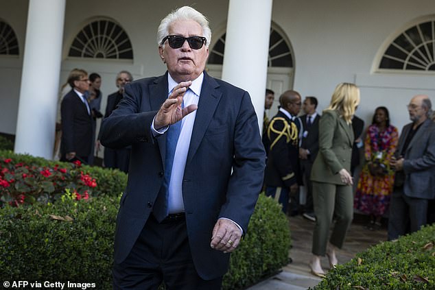 Actor Martin Sheen waves to attendees at a White House event Friday marking the 25th anniversary of the television show The West Wing