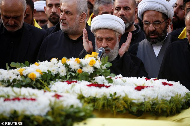 Qassem leads funeral prayers during the funeral of Aqil and Hezbollah member Mahmoud Hamad