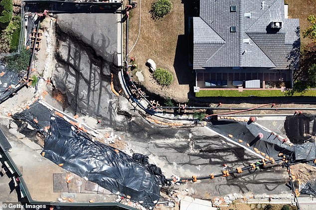 The coastal community has been struggling with landslides since torrential rains hit the area last spring. (Image: An aerial view of the damage in Rancho Palos Verdes)