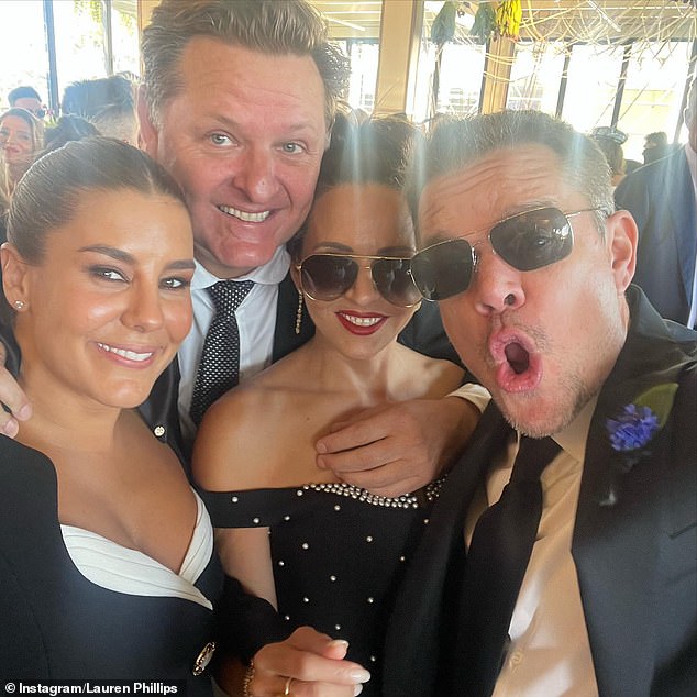 Phillips is bonding with A-listers as she attends celebrity events with her fiancé Paul O'Brien (second left), who flies stars across Australia with his private jet company