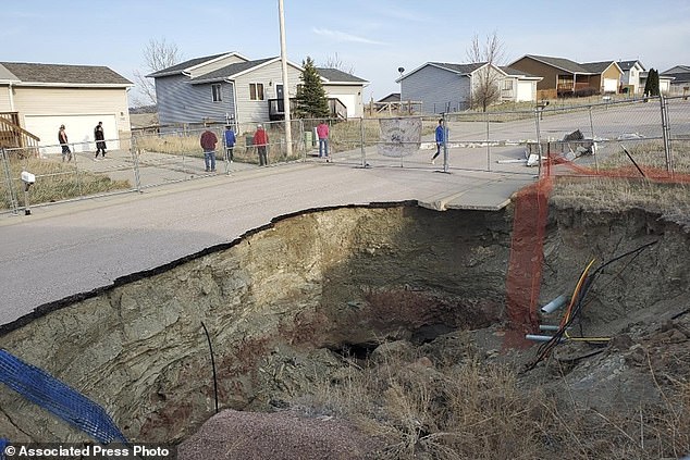 This photo taken on April 27, 2022, shows a sinkhole in the Hideaway Hills neighborhood near Rapid City