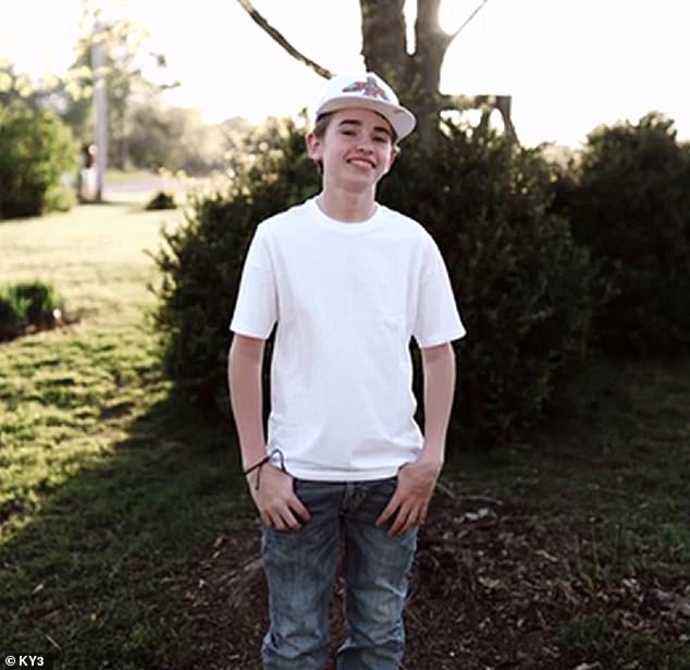 Riley Grunden's 13-year-old son, pictured, was suspended for three days from Liberty Middle School in the small town of Mountain View after her son admitted to posting the photo