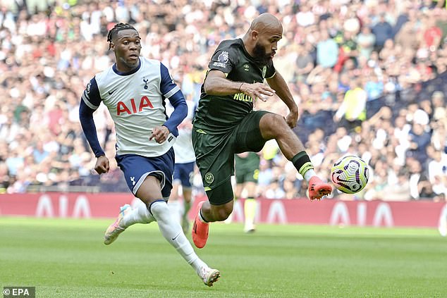 Mbeumo (right) scored the wonder goal that left Spurs fans and players 'stunned'